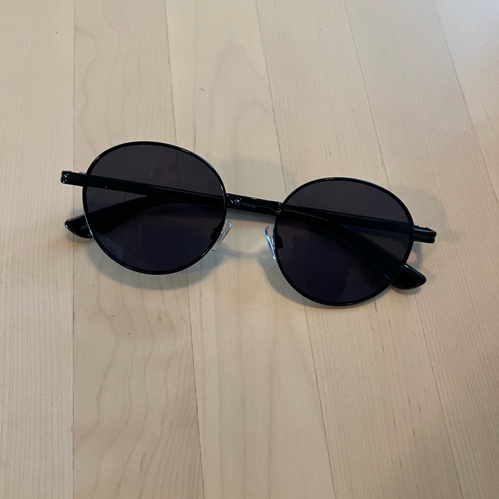 Round black sunglasses